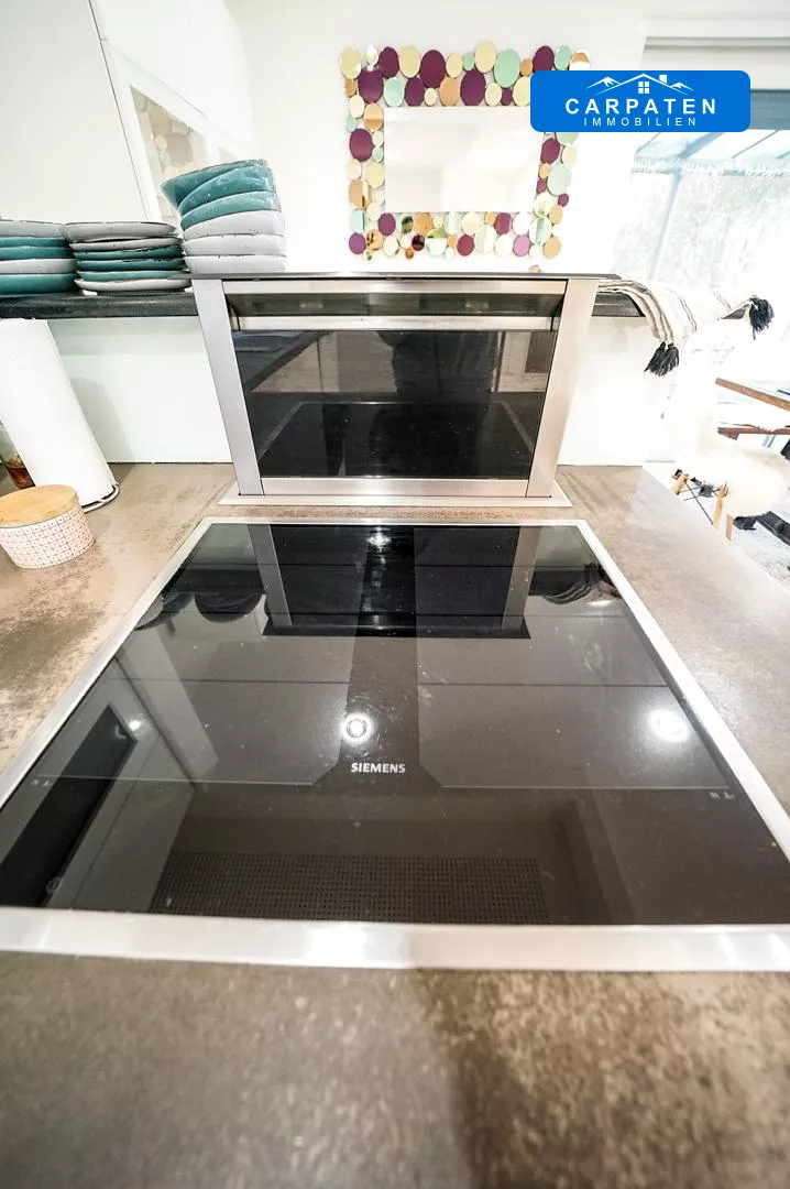 Induktionskochfeld mit Dunstabzug